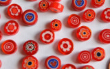 Millefiori Glas Mosaiksteine rund rot 7-15mm 30g ca.25-30St. Millefiori Glas Mosaiksteine rund rot 7-15mm 30g ca.25-30St.