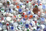 Millefiori Glas Mosaiksteine rund weiß 7-15mm 30g ca. 25-30 St. Millefiori Glas Mosaiksteine rund weiß 7-15mm 30g ca. 25-30 St.